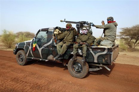 Malian soldiers leave Timbuktu in a pickup truck January 31, 2013. REUTERS/Benoit Tessier Malian soldiers leave Timbuktu in a pickup truck January 31, 2013. REUTERS/Benoit Tessier