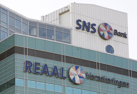 The logos of Dutch banking and insurance group SNS Reaal are seen in Utrecht November 13, 2008. REUTERS/Michael Kooren. The logos of Dutch banking and insurance group SNS Reaal are seen in Utrecht November 13, 2008. REUTERS/Michael Kooren.