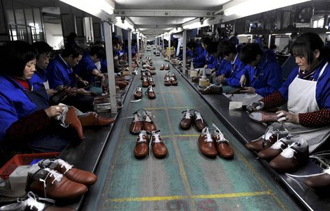 Employees work at a shoe factory in Lishui, Zhejiang province, in this January 24, 2013 file photo. REUTERS/Lang Lang/Files Employees work at a shoe factory in Lishui, Zhejiang province, in this January 24, 2013 file photo. REUTERS/Lang Lang/Files