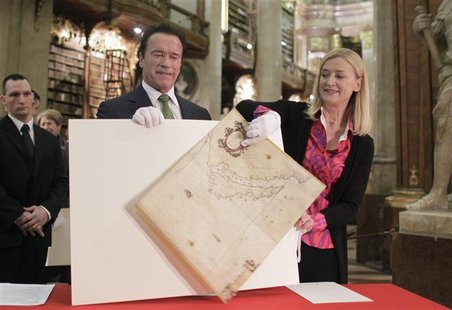 Former U.S. governor of California Arnold Schwarzenegger (L) looks on as director of the Austrian National Library (Oesterreichische Nationa Former U.S. governor of California Arnold Schwarzenegger (L) looks on as director of the Austrian National Library (Oesterreichische Nationa