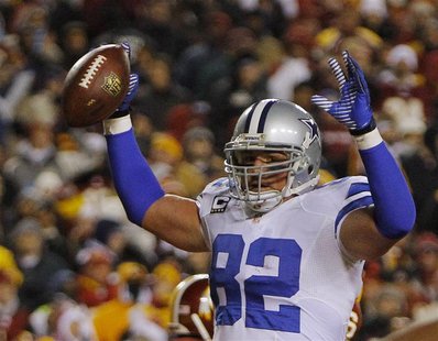 Dallas Cowboys tight end Jason Witten celebrates a touchdown reception from quarterback Tony Romo (not pictured) in the first half of their Dallas Cowboys tight end Jason Witten celebrates a touchdown reception from quarterback Tony Romo (not pictured) in the first half of their