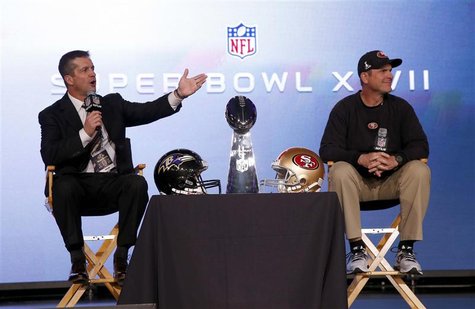 San Francisco 49ers head coach Jim Harbaugh (R) and his brother, Baltimore Ravens head coach John Harbaugh, appear at their joint press conf San Francisco 49ers head coach Jim Harbaugh (R) and his brother, Baltimore Ravens head coach John Harbaugh, appear at their joint press conf