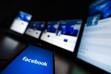 The loading screen of the Facebook application on a mobile phone is seen in this photo illustration taken in Lavigny May 16, 2012. REUTERS/V The loading screen of the Facebook application on a mobile phone is seen in this photo illustration taken in Lavigny May 16, 2012. REUTERS/V
