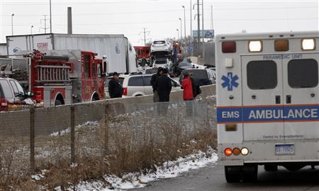 First responders and police officers shut down a freeway due to an accident involving multiple cars and semi-trucks in Detroit, Michigan January 31, 2013. Three people were killed and roughly two dozen were injured.
Credit: REUTERS/Rebecca Cook
First responders and police officers shut down a freeway due to an accident involving multiple cars and semi-trucks in Detroit, Michigan January 31, 2013. Three people were killed and roughly two dozen were injured.
Credit: REUTERS/Rebecca Cook