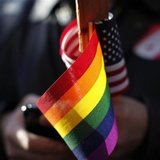A gay pride flag. A gay pride flag.