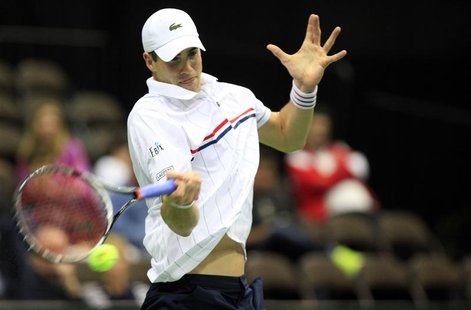 John Isner of the U.S. hits a return to Brazil's Thiago Alves during their Davis Cup tennis match in Jacksonville, Florida February 1, 2013. John Isner of the U.S. hits a return to Brazil's Thiago Alves during their Davis Cup tennis match in Jacksonville, Florida February 1, 2013.
