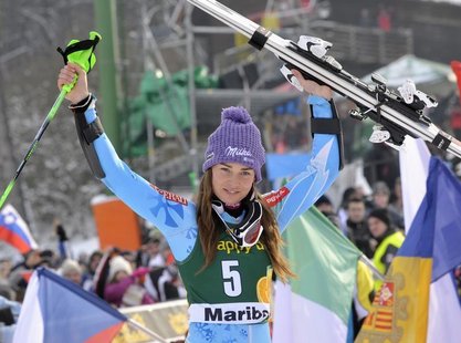 Tina Maze of Slovenia celebrates after winning the World Cup Women's Slalom race in Maribor, January 27, 2013. REUTERS/Srdjan Zivulovic Tina Maze of Slovenia celebrates after winning the World Cup Women's Slalom race in Maribor, January 27, 2013. REUTERS/Srdjan Zivulovic