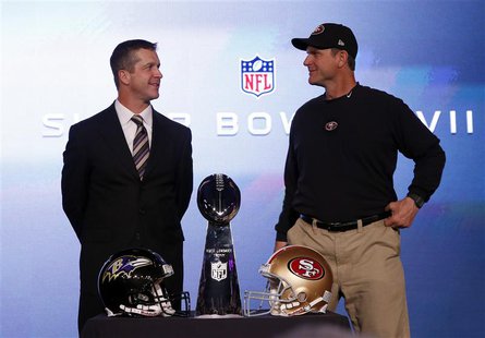 San Francisco 49ers head coach Jim Harbaugh (R) and his brother, Baltimore Ravens head coach John Harbaugh, appear at their joint press conf San Francisco 49ers head coach Jim Harbaugh (R) and his brother, Baltimore Ravens head coach John Harbaugh, appear at their joint press conf