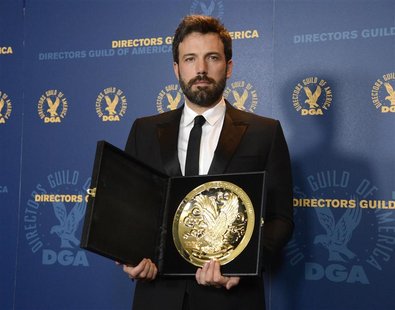 Ben Affleck poses for photographers with the Feature Film Award at the 65th annual Directors Guild of America Awards in Los Angeles, Februar Ben Affleck poses for photographers with the Feature Film Award at the 65th annual Directors Guild of America Awards in Los Angeles, Februar