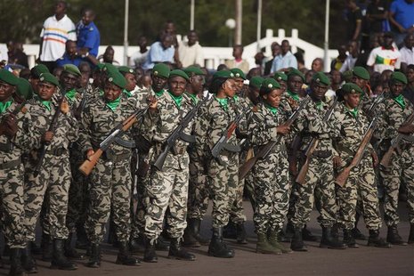 Malian soldiers stand guard before the arrival of France's President Francois Hollande at Independence Plaza in Bamako, Mali February 2, 201 Malian soldiers stand guard before the arrival of France's President Francois Hollande at Independence Plaza in Bamako, Mali February 2, 201