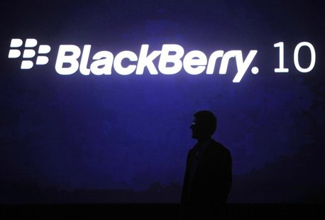 Research in Motion Chief Executive Officer Thorsten Heins is silhouetted during the BlackBerry World event in Orlando, in this file picture Research in Motion Chief Executive Officer Thorsten Heins is silhouetted during the BlackBerry World event in Orlando, in this file picture