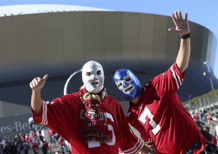 San Francisco 49ers fans cheer in front of the Superdome before the NFL Super Bowl XLVII football game against the Baltimore Ravens in New O San Francisco 49ers fans cheer in front of the Superdome before the NFL Super Bowl XLVII football game against the Baltimore Ravens in New O