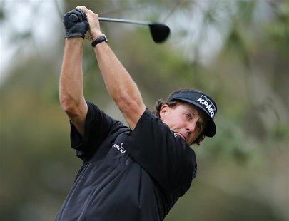 U.S. golfer Phil Mickelson hits off the 11th tee of the north course at Torrey Pines during first round play at the Farmers Insurance Open i U.S. golfer Phil Mickelson hits off the 11th tee of the north course at Torrey Pines during first round play at the Farmers Insurance Open i
