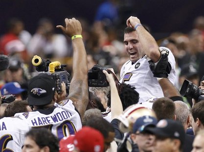 Baltimore Ravens MVP quarterback Joe Flacco (R) celebrates victory over the San Francisco 49ers in the Super Bowl XLVII football game in New Baltimore Ravens MVP quarterback Joe Flacco (R) celebrates victory over the San Francisco 49ers in the Super Bowl XLVII football game in New