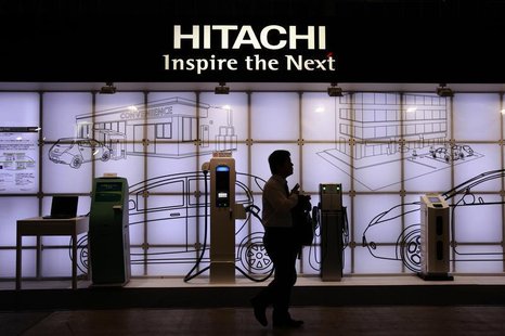 A man walks past Hitachi's booth at CEATEC JAPAN 2012 electronics show in Chiba, east of Tokyo, October 2, 2012. REUTERS/Yuriko Nakao A man walks past Hitachi's booth at CEATEC JAPAN 2012 electronics show in Chiba, east of Tokyo, October 2, 2012. REUTERS/Yuriko Nakao