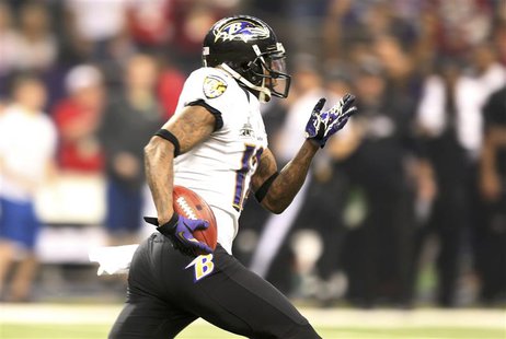 Baltimore Ravens' Jacoby Jones heads up field en route to scoring a touchdown on a kickoff return at the start of the third quarter against Baltimore Ravens' Jacoby Jones heads up field en route to scoring a touchdown on a kickoff return at the start of the third quarter against