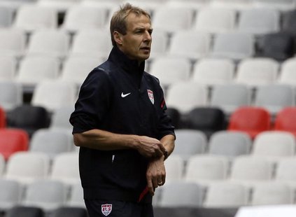 Head coach of the U.S. national soccer team Jurgen Klinsmann of Germany looks at his players during a practice session at the Azteca stadium Head coach of the U.S. national soccer team Jurgen Klinsmann of Germany looks at his players during a practice session at the Azteca stadium