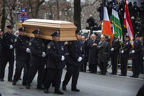 Mayor of New York Michael Bloomberg stands with former New York mayors Rudolph W. Giuliani (C) and David Dinkins as they salute the casket o Mayor of New York Michael Bloomberg stands with former New York mayors Rudolph W. Giuliani (C) and David Dinkins as they salute the casket o