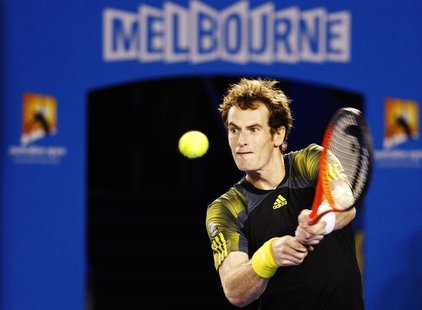 Andy Murray of Britain hits a return to Novak Djokovic of Serbia during their men's singles final match at the Australian Open tennis tourna Andy Murray of Britain hits a return to Novak Djokovic of Serbia during their men's singles final match at the Australian Open tennis tourna