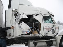 Semi tractor damaged by snowplow truck Semi tractor damaged by snowplow truck