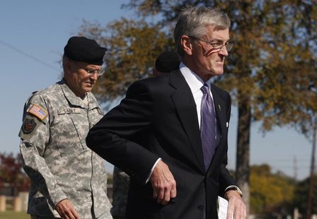 Secretary of the Army John M. McHugh (R) and Army Chief of Staff General George Casey (L) make their way to the podium to address the media Secretary of the Army John M. McHugh (R) and Army Chief of Staff General George Casey (L) make their way to the podium to address the media