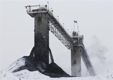 Processed coal streams out into a pile after being cleaned in the prep plant at the Century Mine near Beallsville, Ohio, January 25, 2013. W Processed coal streams out into a pile after being cleaned in the prep plant at the Century Mine near Beallsville, Ohio, January 25, 2013. W