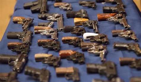 A view shows confiscated guns on a table during a news conference where New York City Mayor Michael Bloomberg, Police Commissioner Ray Kelly A view shows confiscated guns on a table during a news conference where New York City Mayor Michael Bloomberg, Police Commissioner Ray Kelly