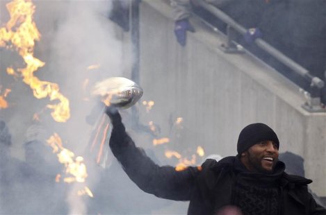 Super Bowl XLVII champion Baltimore Ravens linebacker Ray Lewis, who is retiring from the NFL, carries in the Vince Lombardi Championship Tr Super Bowl XLVII champion Baltimore Ravens linebacker Ray Lewis, who is retiring from the NFL, carries in the Vince Lombardi Championship Tr