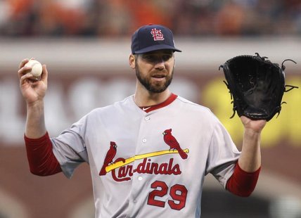 St. Louis Cardinals starting pitcher Chris Carpenter looks to catcher Yadier Molina in the fourth inning as he pitches against the San Franc St. Louis Cardinals starting pitcher Chris Carpenter looks to catcher Yadier Molina in the fourth inning as he pitches against the San Franc