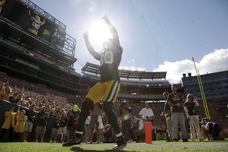 Green Bay Packers' Donald Driver is announced before the start of the NFL football game against the San Francisco 49ers in Green Bay, Wiscon Green Bay Packers' Donald Driver is announced before the start of the NFL football game against the San Francisco 49ers in Green Bay, Wiscon