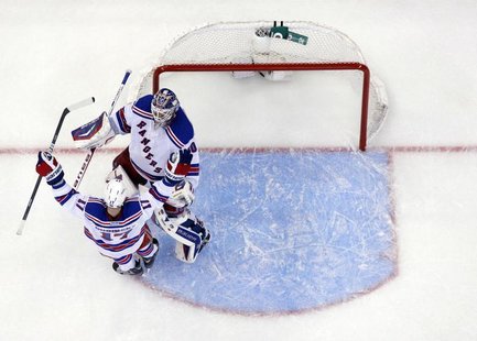 New York Rangers' Brandon Dubinsky celebrates with goalie Henrik Lundqvist after beating the Ottawa Senators in game 3 of their NHL Eastern New York Rangers' Brandon Dubinsky celebrates with goalie Henrik Lundqvist after beating the Ottawa Senators in game 3 of their NHL Eastern
