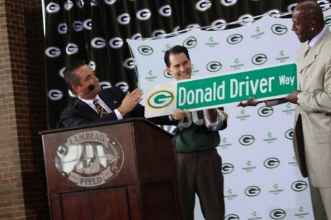 Green Bay Mayor Jim Schmitt unveils "Donald Driver Way" street sign during Lambeau Field retirement ceremony on Feb. 6, 2013. Green Bay Mayor Jim Schmitt unveils "Donald Driver Way" street sign during Lambeau Field retirement ceremony on Feb. 6, 2013.