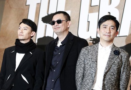 Hong Kong director Wong Kar Wai (C), actor Tony Leung (R) and Taiwanese actor Chang Chen pose during a news conference to promote their new Hong Kong director Wong Kar Wai (C), actor Tony Leung (R) and Taiwanese actor Chang Chen pose during a news conference to promote their new