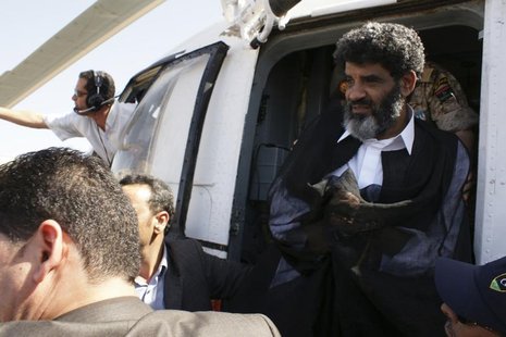 Muammar Gaddafi's former spy chief Abdullah al-Senussi arrives in Tripoli September 5, 2012. REUTERS/Libyan National Guard/Handout Muammar Gaddafi's former spy chief Abdullah al-Senussi arrives in Tripoli September 5, 2012. REUTERS/Libyan National Guard/Handout