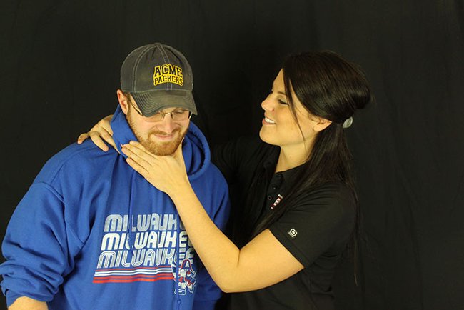 Now I guess Jess is choking Jon so he will smile for the picture. Hey it worked. We got a picture.