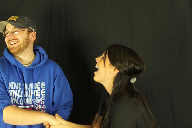 Jess begging Jon to smile for a picture.