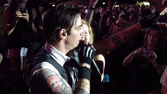And into the crowd Adam goes