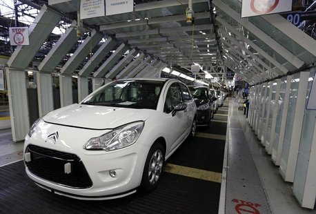 Citroen C3 automobiles are seen on the idled assembly line as striking employees prevent their colleagues from working at the PSA-Peugeot Ci Citroen C3 automobiles are seen on the idled assembly line as striking employees prevent their colleagues from working at the PSA-Peugeot Ci