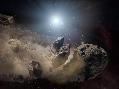 Image courtesy of NASA shows an artist's concept of a broken-up asteroid. Scientists think that a giant asteroid, which broke up long ago in Image courtesy of NASA shows an artist's concept of a broken-up asteroid. Scientists think that a giant asteroid, which broke up long ago in