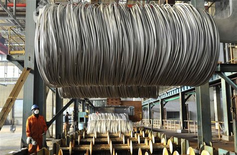 An employee works on a steel production line at an export factory in Dalian, Liaoning province, February 8, 2013. REUTERS/China Daily An employee works on a steel production line at an export factory in Dalian, Liaoning province, February 8, 2013. REUTERS/China Daily