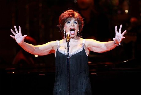 Dame Shirley Bassey performs during the 21st birthday celebration of the Rainforest Fund at Carnegie Hall in New York May 13, 2010. REUTERS/ Dame Shirley Bassey performs during the 21st birthday celebration of the Rainforest Fund at Carnegie Hall in New York May 13, 2010. REUTERS/