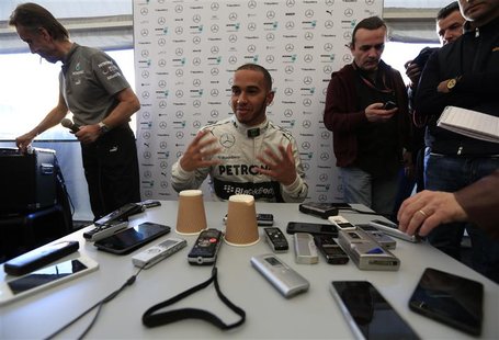 Mercedes Formula One racing driver Lewis Hamilton of Britain attends a news conference at the Jerez racetrack in southern Spain February 4, Mercedes Formula One racing driver Lewis Hamilton of Britain attends a news conference at the Jerez racetrack in southern Spain February 4,