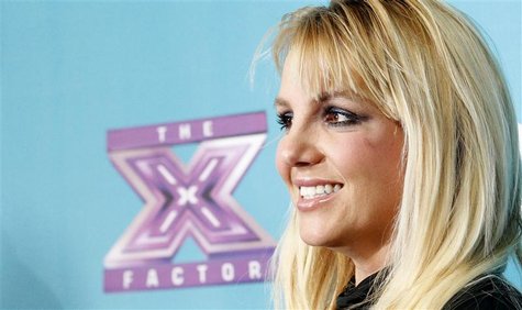 Judge Britney Spears poses at the party for the television series "The X Factor" finalists in Los Angeles, California November 5, 2012. REUT Judge Britney Spears poses at the party for the television series "The X Factor" finalists in Los Angeles, California November 5, 2012. REUT