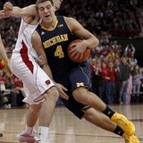 Wisconsin beats No. 3 Michigan 65-62 in OT