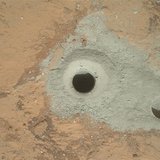 At the center of this image released to Reuters on February 9, 2013 from NASA's Curiosity rover is the hole in a rock called "John Klein" wh