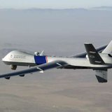 A U.S. Customs and Border Protection Predator B drone flies over an undisclosed location in this undated photograph. Customs and Border Protection has been flying drones over the Arizona desert and southwest border with Mexico since 2006 and will soon deploy one in North Dakota to patrol the Canadian border as well. To match feature USA-SECURITY/DRONES REUTERS/General Atomics Aeronautical Systems/Handout (UNITED STATES). 
