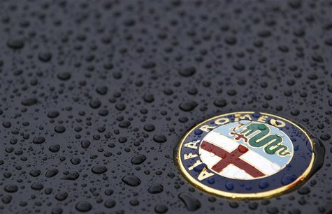The Alfa Romeo logo is seen on an Alfa Romeo Spider during an Alfa Romeo classic car meeting in Fiuggi, south of Rome, June 9, 2012. REUTERS The Alfa Romeo logo is seen on an Alfa Romeo Spider during an Alfa Romeo classic car meeting in Fiuggi, south of Rome, June 9, 2012. REUTERS