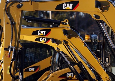 CAT machines are seen on a lot at Milton CAT in North Reading, Massachusetts January 23, 2013. REUTERS/Jessica Rinaldi CAT machines are seen on a lot at Milton CAT in North Reading, Massachusetts January 23, 2013. REUTERS/Jessica Rinaldi