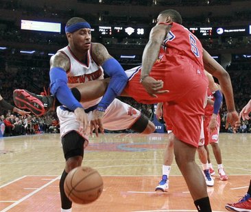 New York Knicks forward Carmelo Anthony (7) tries to pass against Los Angeles Clippers center DeAndre Jordan (6) in the first quarter of the New York Knicks forward Carmelo Anthony (7) tries to pass against Los Angeles Clippers center DeAndre Jordan (6) in the first quarter of the