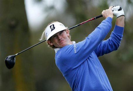 U.S. golfer Brandt Snedeker hits a drive off the 11th tee of the south course at Torrey Pines during first round play at the Farmers Insuran U.S. golfer Brandt Snedeker hits a drive off the 11th tee of the south course at Torrey Pines during first round play at the Farmers Insuran